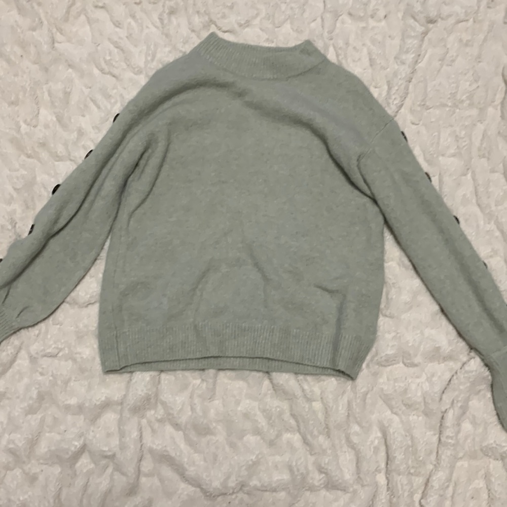 Target turtle neck sweater with buttons on the arm